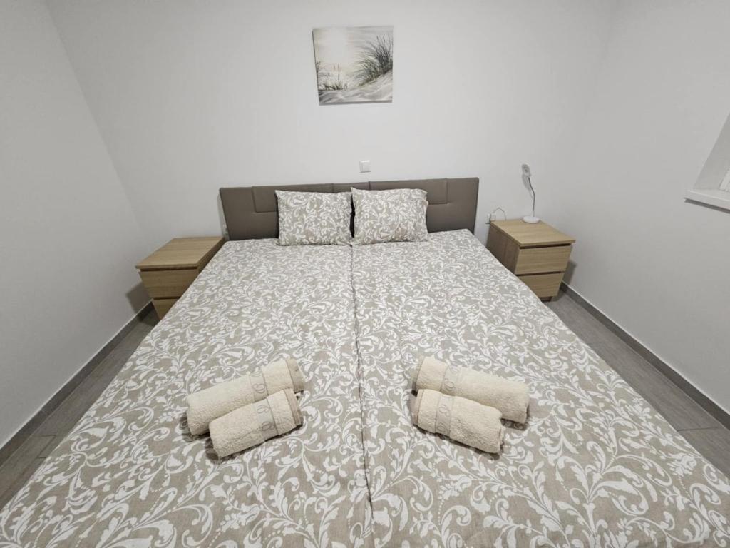 Postel nebo postele na pokoji v ubytování Apartma Zala