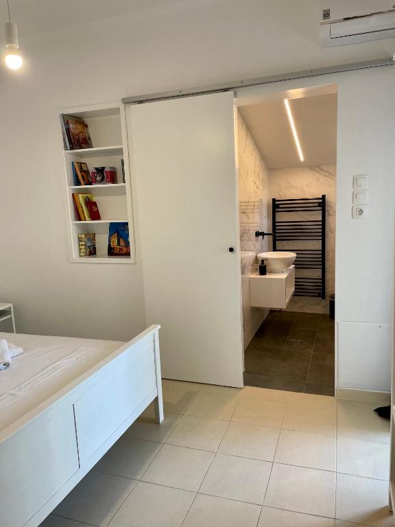 Postel nebo postele na pokoji v ubytování Casa Posidonia