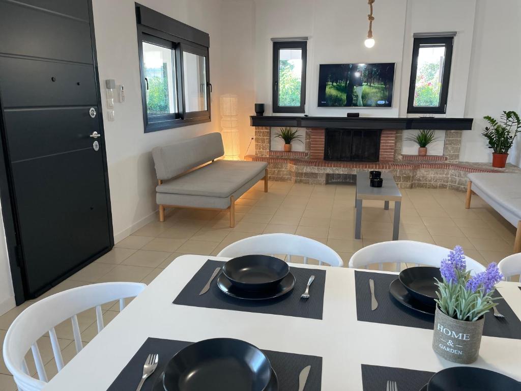 TV a/nebo společenská místnost v ubytování Casa Posidonia