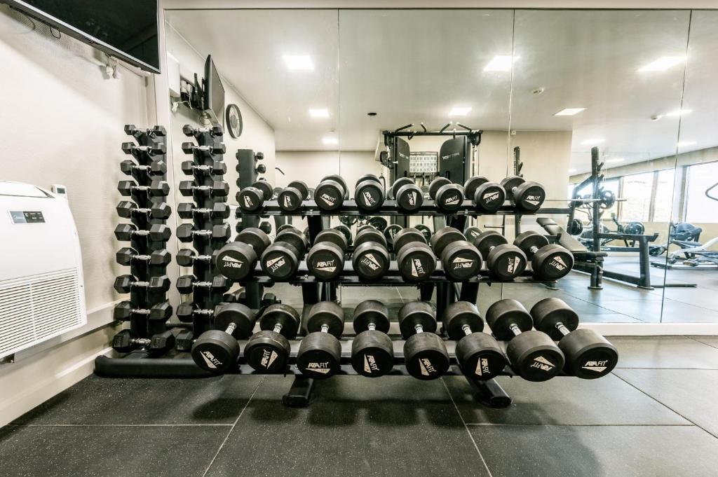 A dumbbell station in the hotel fitness room.