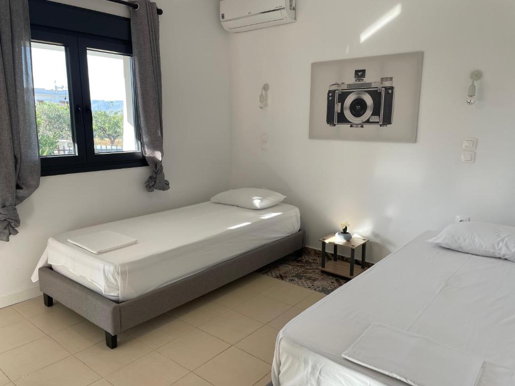 Postel nebo postele na pokoji v ubytování Casa Posidonia