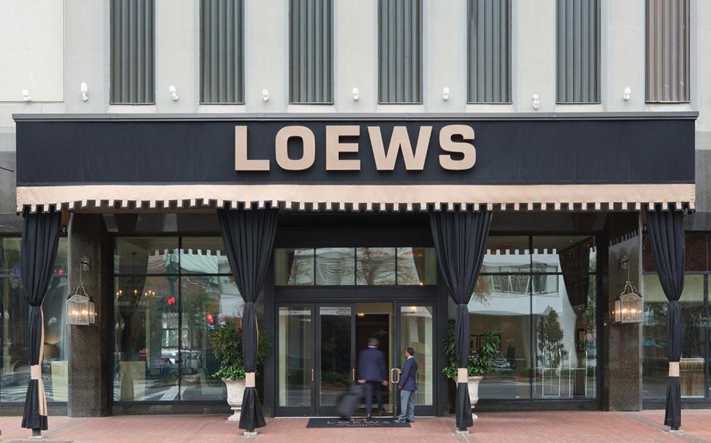a store front with a lewis sign on it at Loews New Orleans Hotel in New Orleans