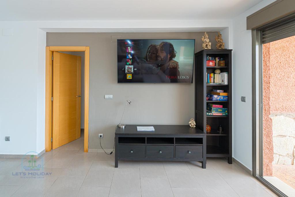TV a/nebo společenská místnost v ubytování Villa Dolores Perfect Villa for Holidays