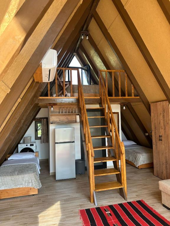 Postel nebo postele na pokoji v ubytování Rent Cabin Miri