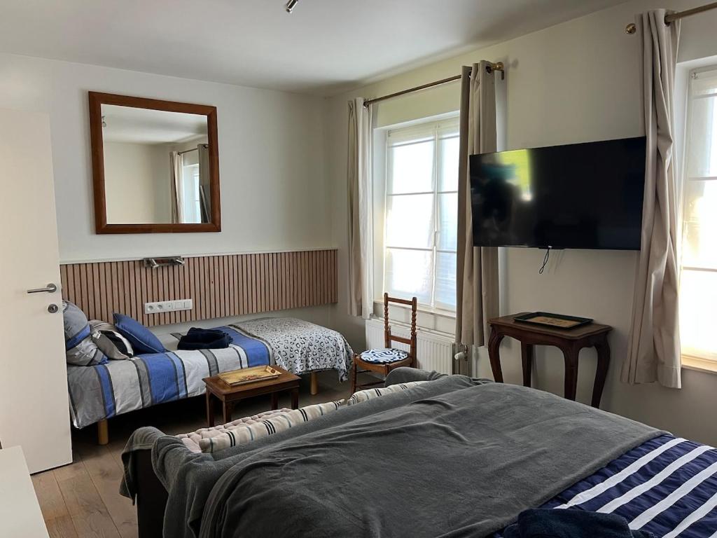 Postel nebo postele na pokoji v ubytování Céline Apartment