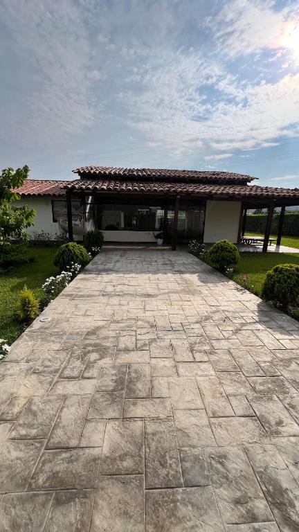a house with a large driveway in front of it at Accommodation in Huaral in Huaral