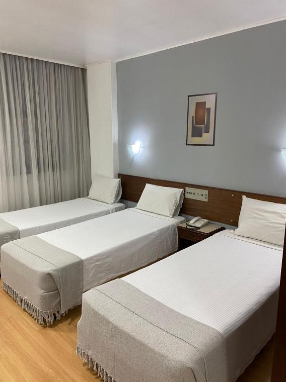 Postel nebo postele na pokoji v ubytování City Hotel by Fast10