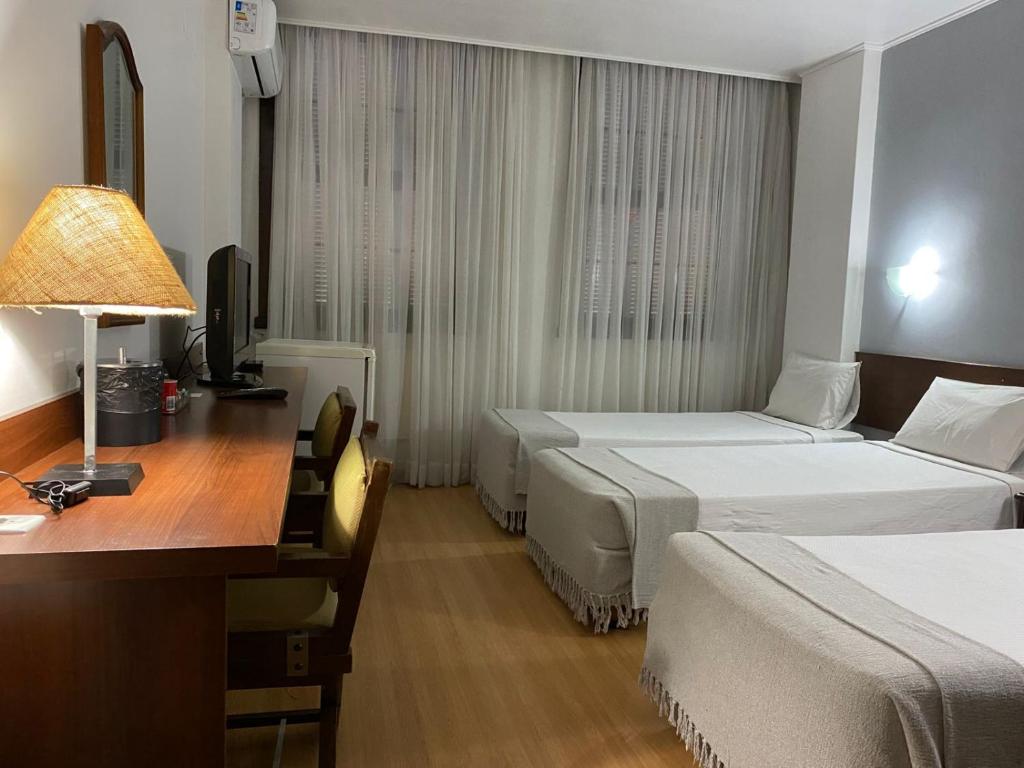 Postel nebo postele na pokoji v ubytování City Hotel by Fast10