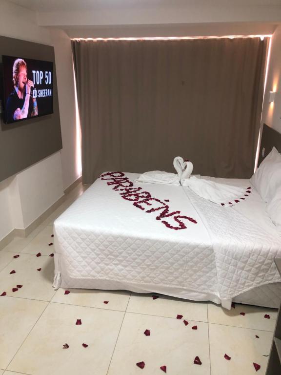 Postel nebo postele na pokoji v ubytování Manaíra Apart Hotel
