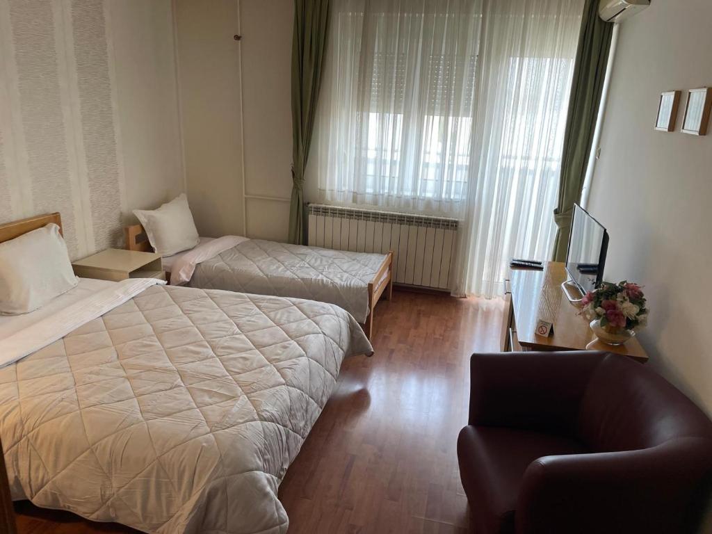 Postel nebo postele na pokoji v ubytování Hotel Belvedere Casa