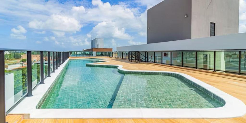 Πισίνα στο ή κοντά στο LocFlat106 Porto de Galinhas no centro 5min praia