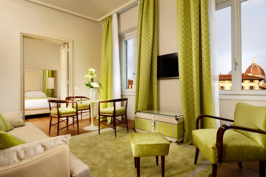 TV a/nebo společenská místnost v ubytování Grand Hotel Minerva