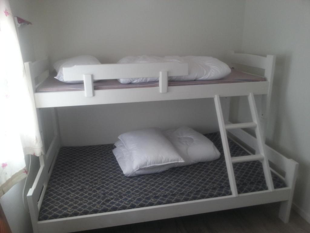 Postel nebo postele na pokoji v ubytování Bøyum Camping
