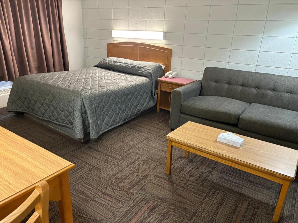 Posezení v ubytování Camelot Court Motel