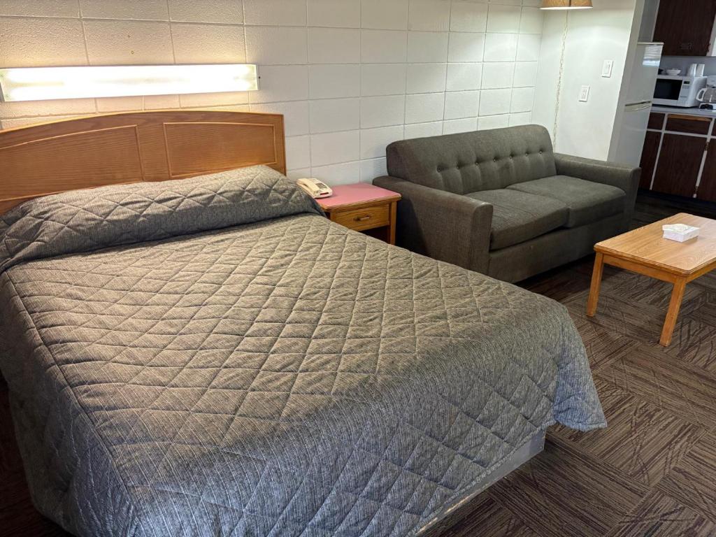 Posezení v ubytování Camelot Court Motel