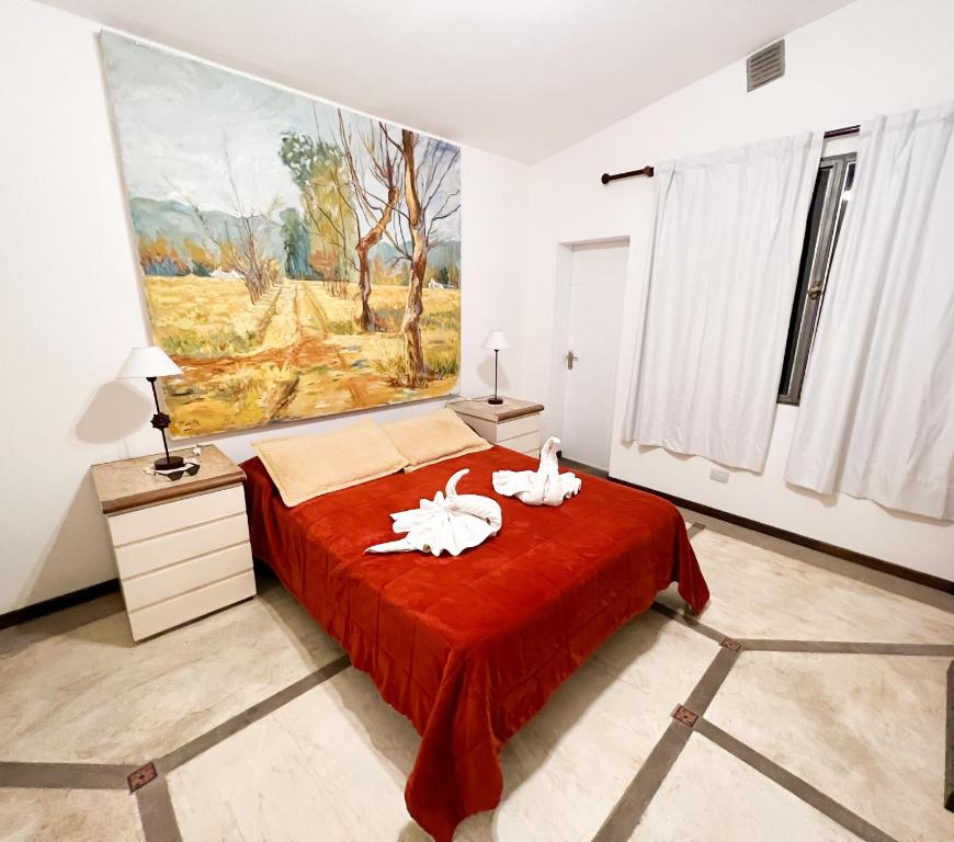 Una cama o camas en una habitación de Soles Blancos Serranita