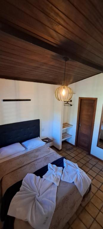 Postel nebo postele na pokoji v ubytování Chalé Paraíso, Praia da Pipa