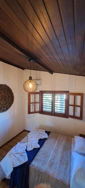 Postel nebo postele na pokoji v ubytování Chalé Paraíso, Praia da Pipa