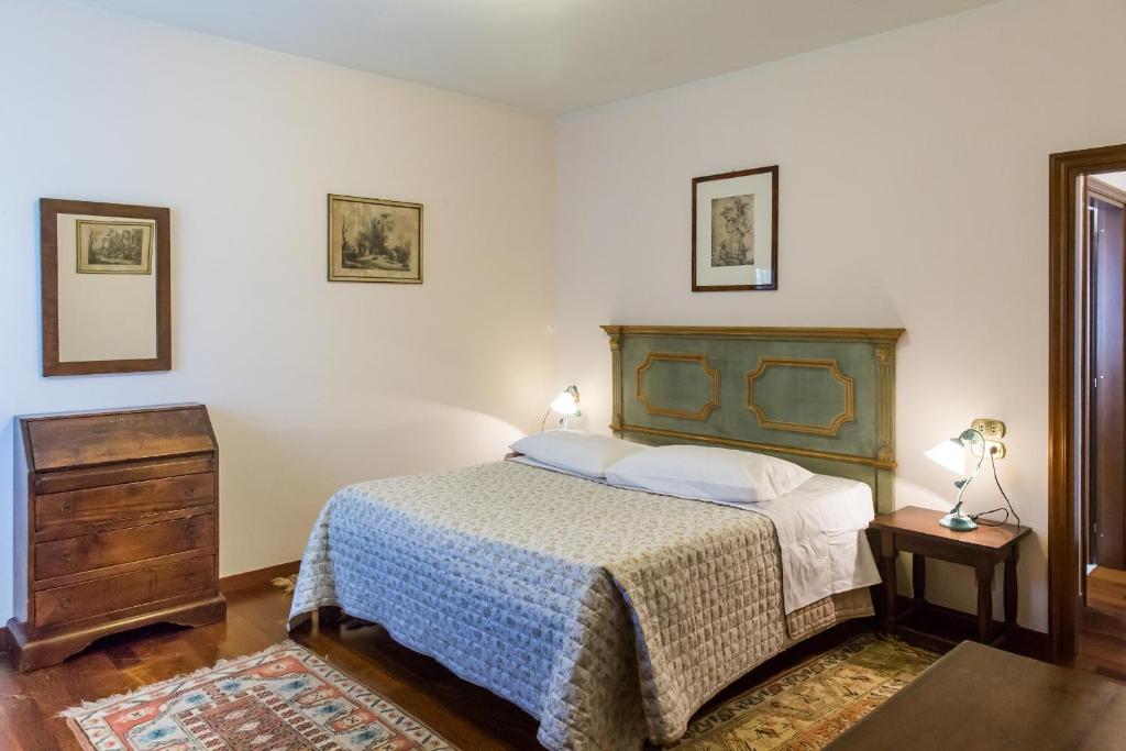 A bed or beds in a room at Agriturismo Le Anfore
