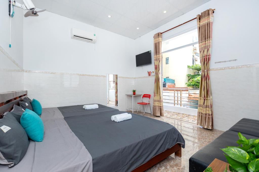 Postel nebo postele na pokoji v ubytování Tram An Homestay