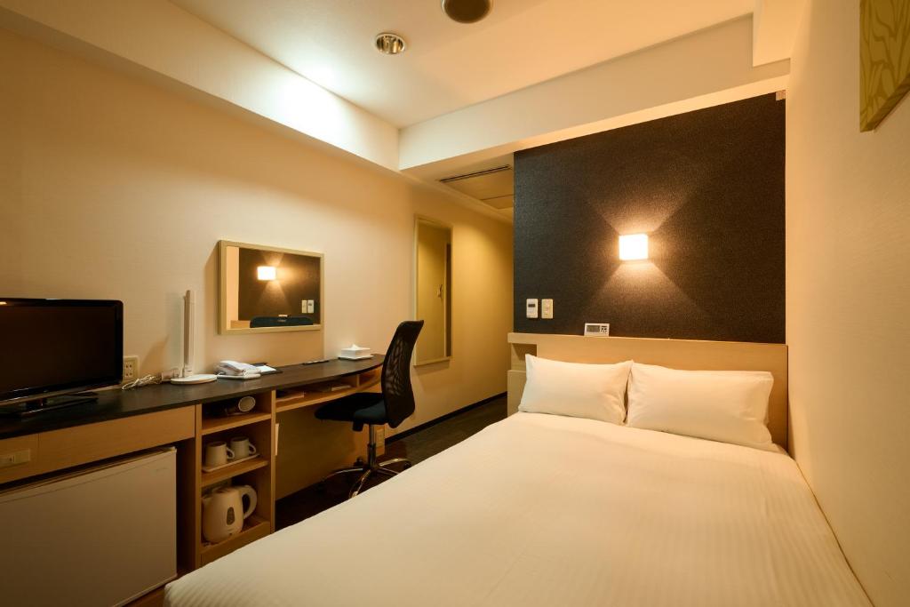 TV a/nebo společenská místnost v ubytování Smile Hotel Kyoto Shijo