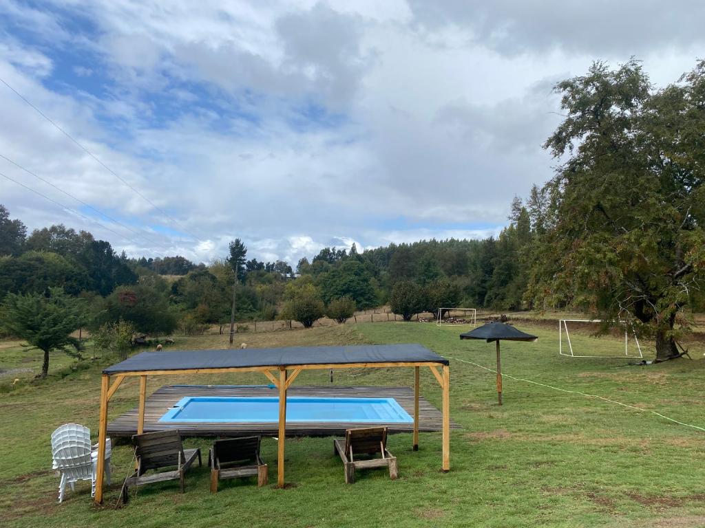 Bazén v ubytování La cabaña del cordero nebo v jeho okolí