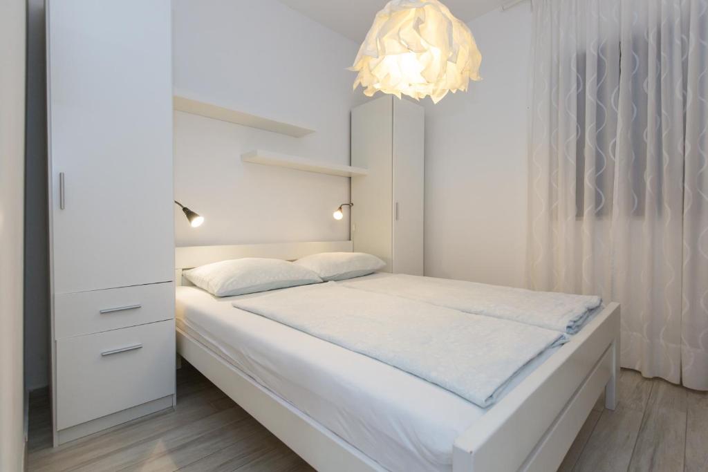 Posteľ alebo postele v izbe v ubytovaní Istria Sea Side Apartment 210 & 209