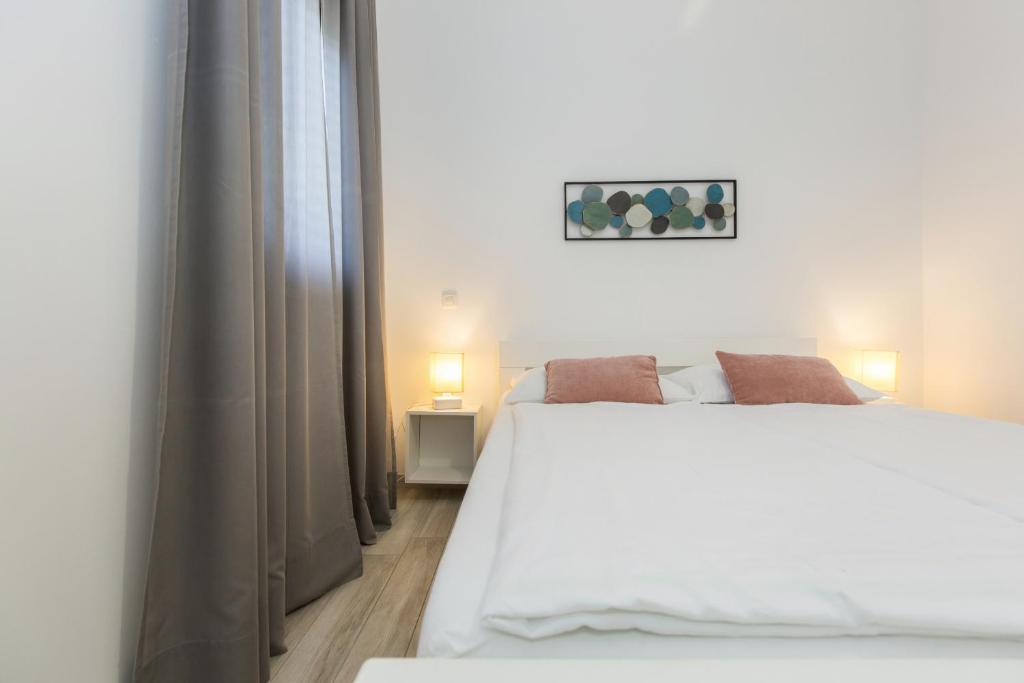 Posteľ alebo postele v izbe v ubytovaní Istria Sea Side Apartment 210 & 209
