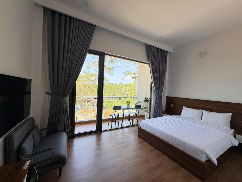 Postel nebo postele na pokoji v ubytování Gemstone Villa Măng Đen