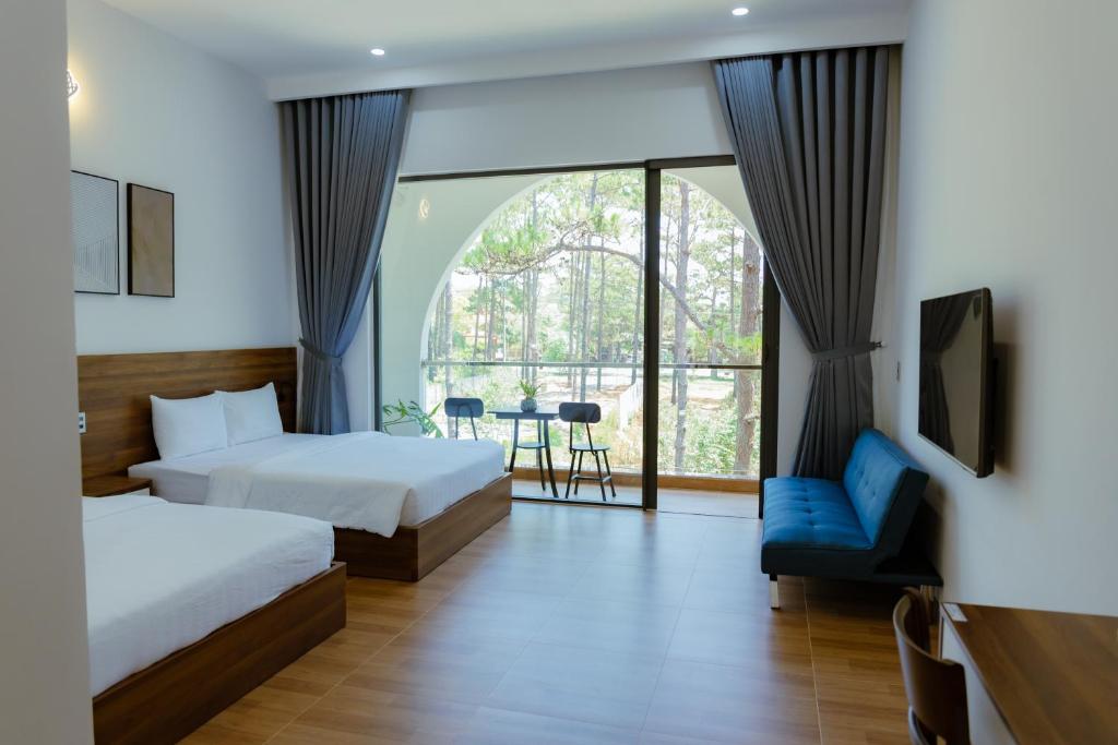 Postel nebo postele na pokoji v ubytování Gemstone Villa Măng Đen