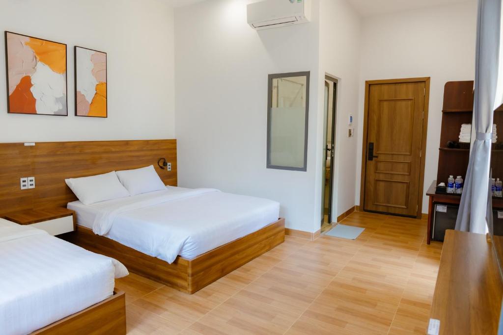 Postel nebo postele na pokoji v ubytování Gemstone Villa Măng Đen