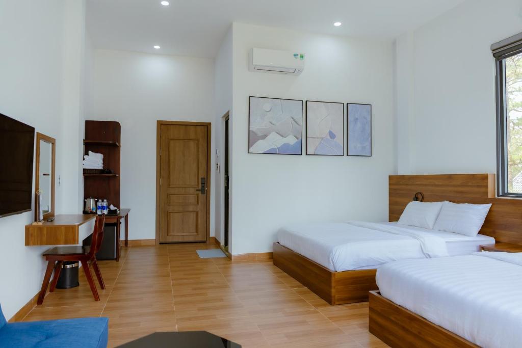 Postel nebo postele na pokoji v ubytování Gemstone Villa Măng Đen