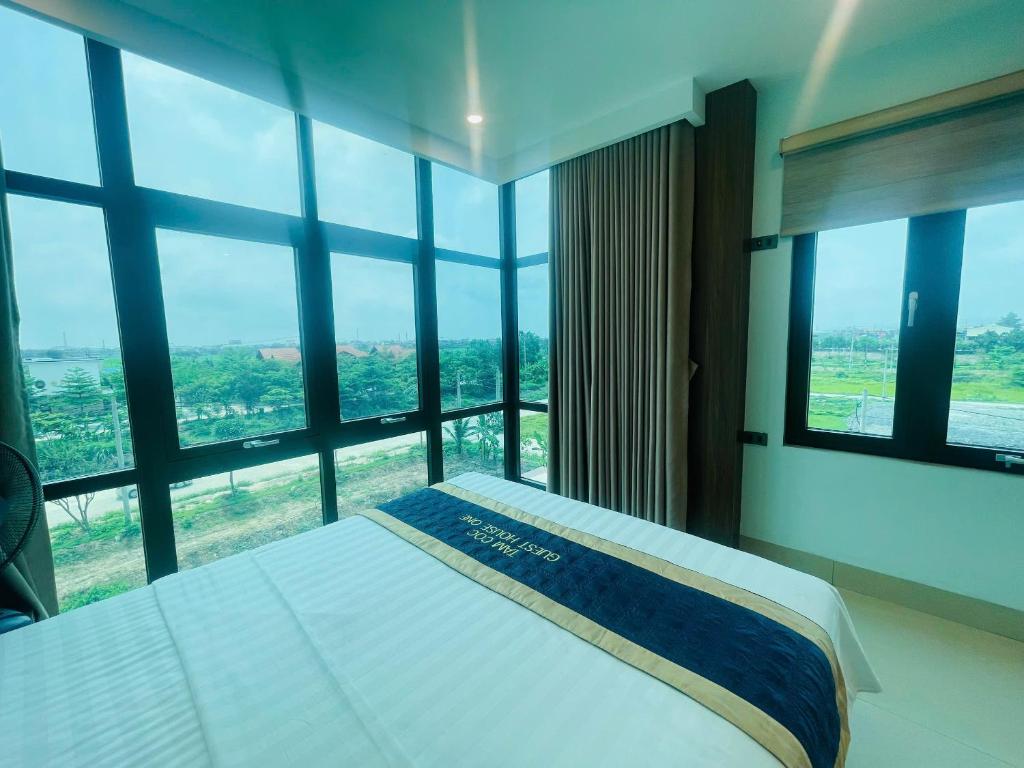 Postel nebo postele na pokoji v ubytování Tam Coc Guest House One & Hotel Ninh Binh