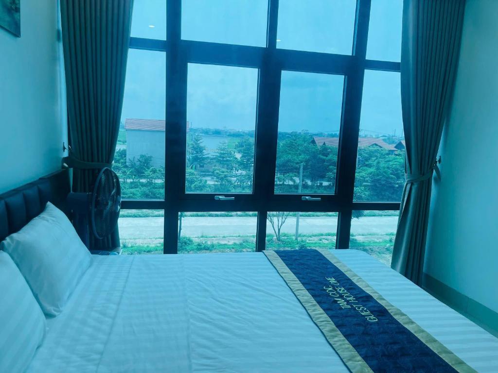 Postel nebo postele na pokoji v ubytování Tam Coc Guest House One & Hotel Ninh Binh
