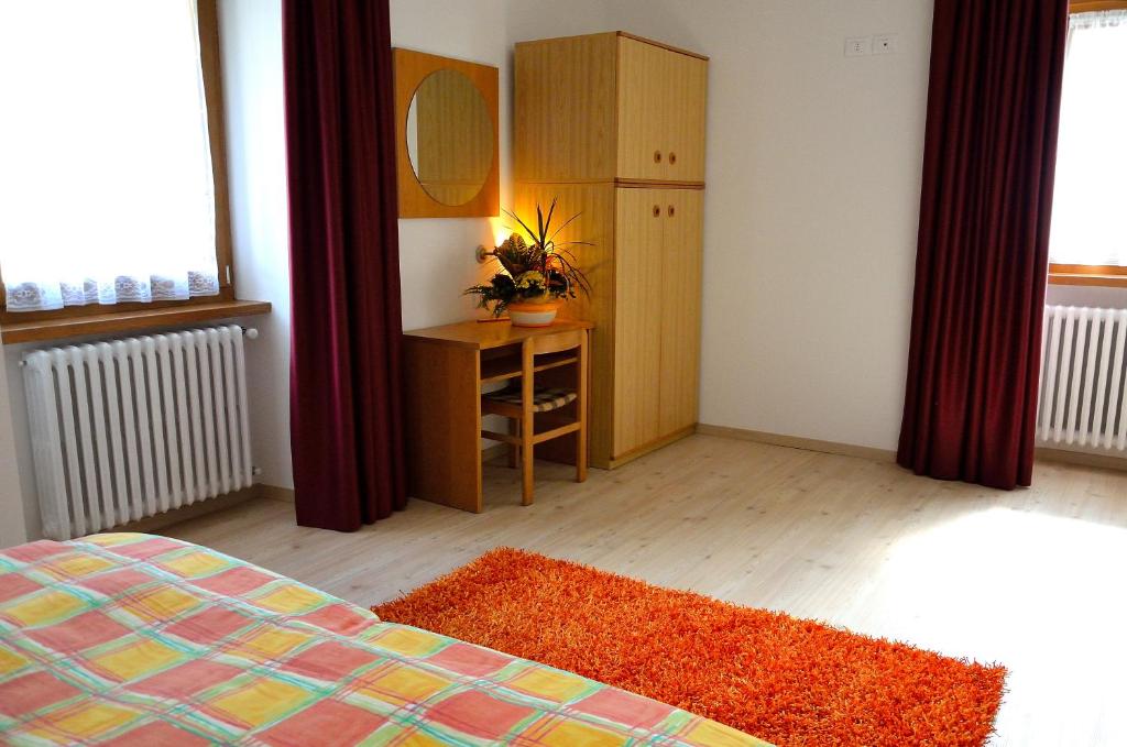 Postel nebo postele na pokoji v ubytování B&B Cà dei Baroni