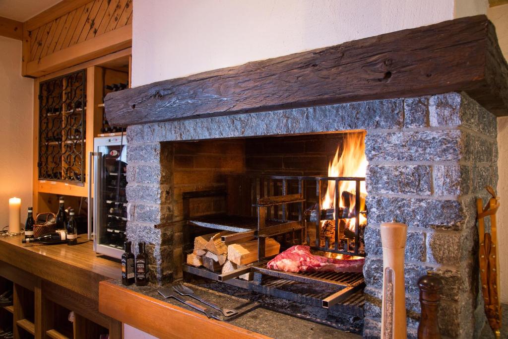 Kuchyň nebo kuchyňský kout v ubytování Hotel Cheminee