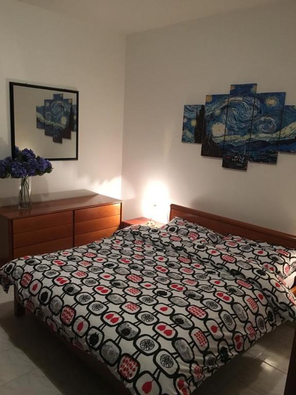 Łóżko lub łóżka w pokoju w obiekcie Appartamento Colli & Terme