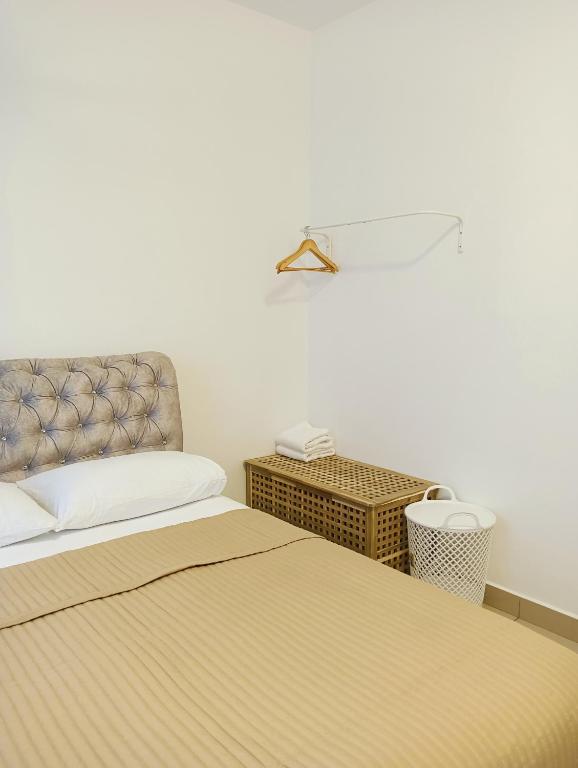 Postel nebo postele na pokoji v ubytování Mslim Friendly Stay at Bayu Aisyah Putrajaya, Presint 11