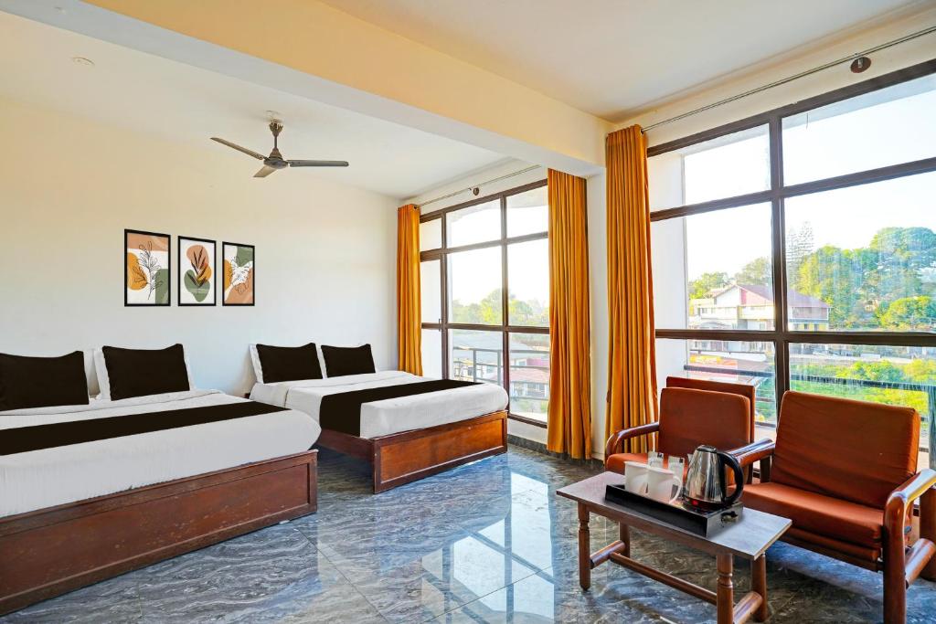 Posezení v ubytování Super Townhouse Madikeri Fort Formerly Hotel Raj