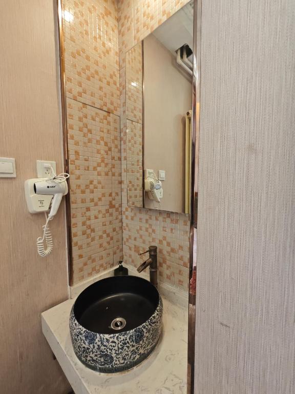 Koupelna v ubytování Beijing Huiqing Garden Bussiness Hotel