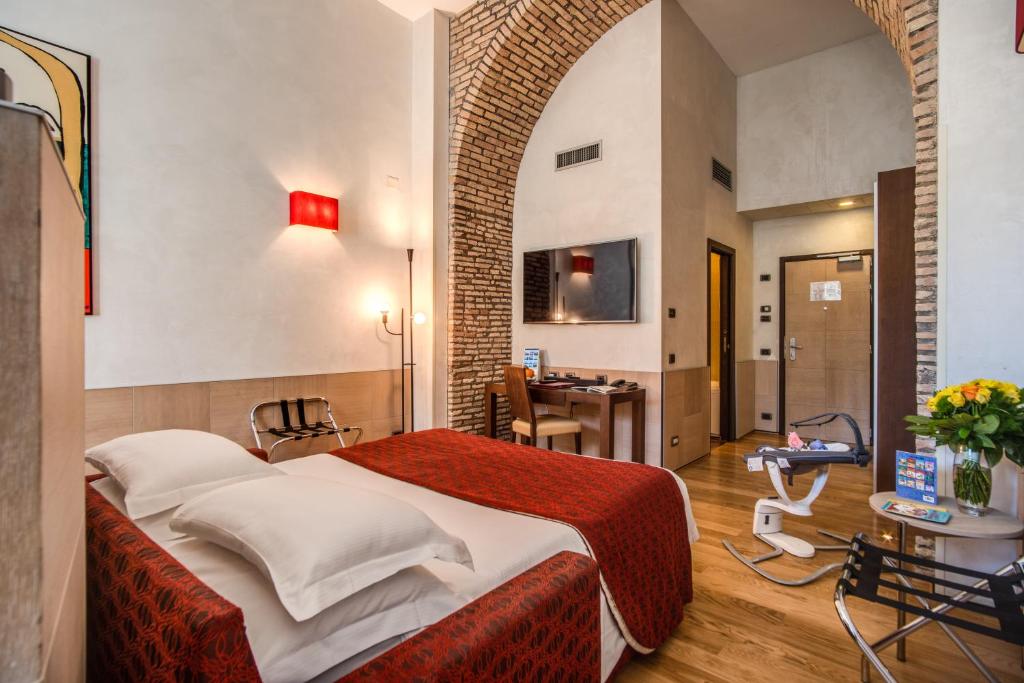 TV a/nebo společenská místnost v ubytování Kolbe Hotel Rome