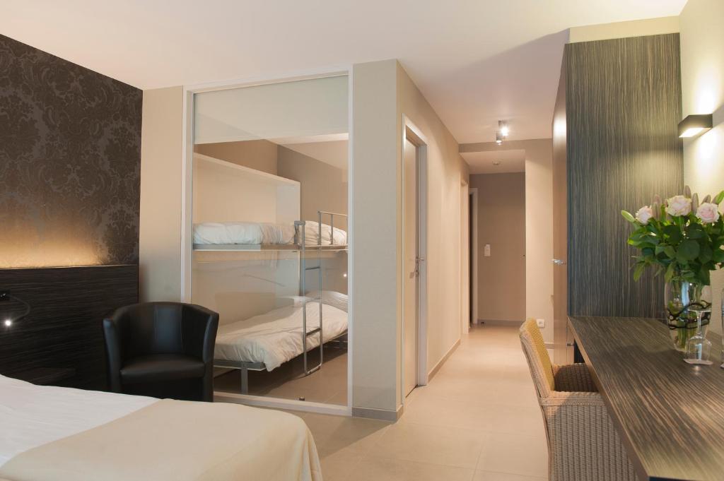 Postel nebo postele na pokoji v ubytování Hotel Princess