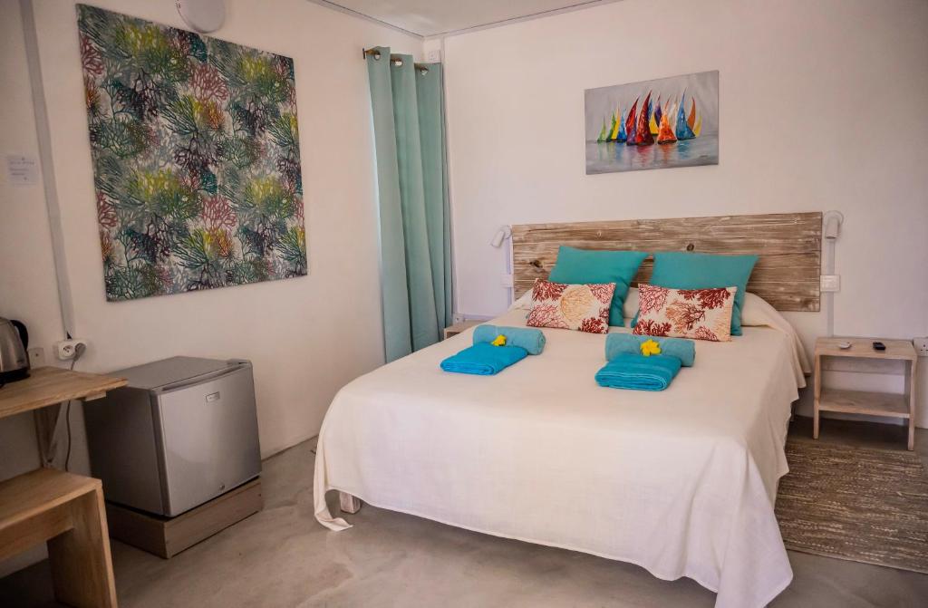 Postel nebo postele na pokoji v ubytování Auberge St Francois
