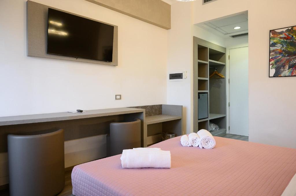 Postel nebo postele na pokoji v ubytování Hotel Casa Tra Noi