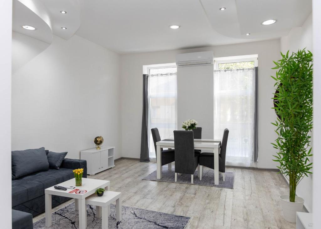 Posezení v ubytování El Mundo Apartman