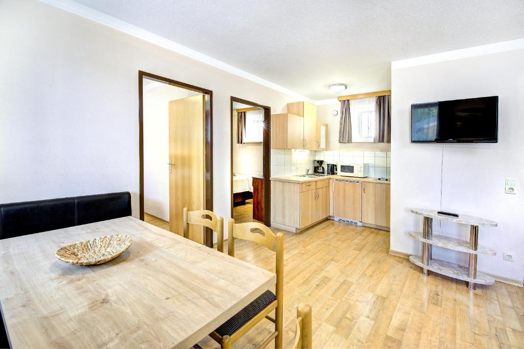 Kuchyňa alebo kuchynka v ubytovaní Appartement Alpensee