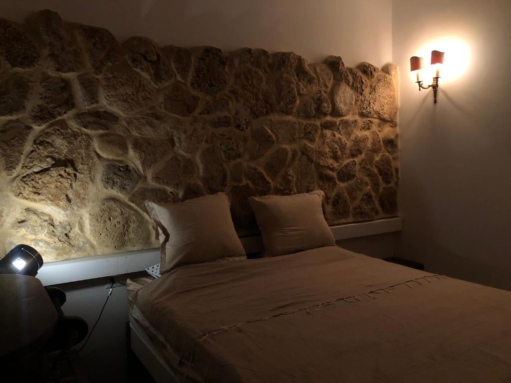 Postel nebo postele na pokoji v ubytování BiZa Coast, Ma Vie Là