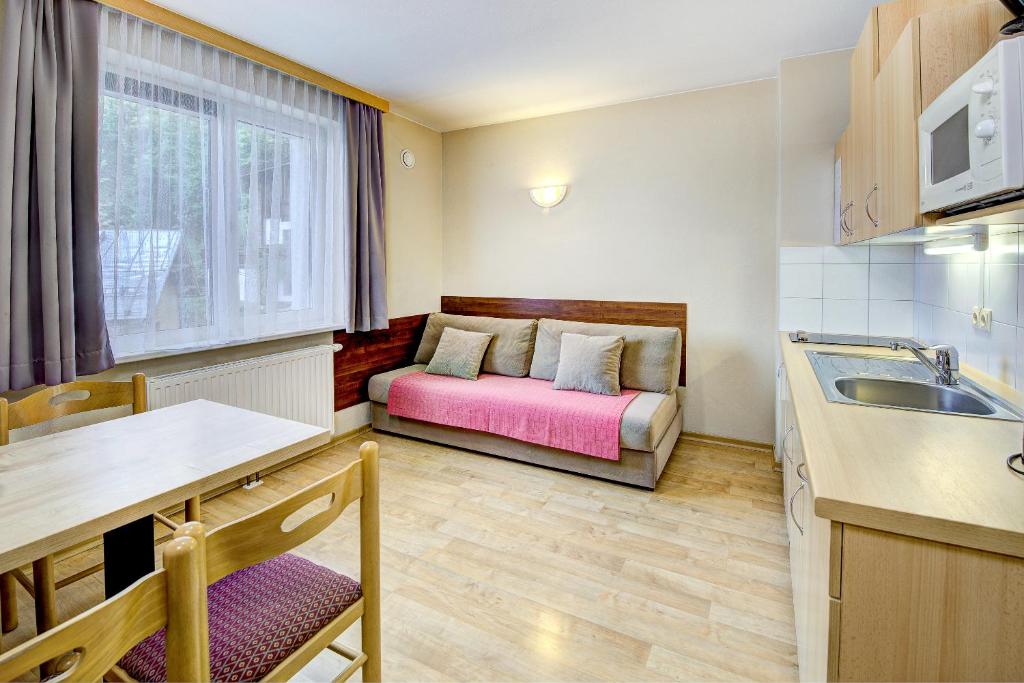 Kuchyňa alebo kuchynka v ubytovaní Appartement Alpensee