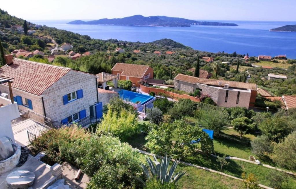 an aerial view of a house and the water at Villa Blue by Villas Guide in Dubrovnik