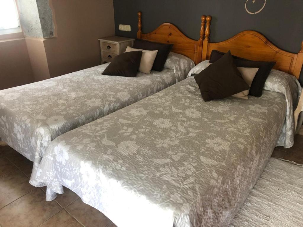 Postel nebo postele na pokoji v ubytování Hostal Ekaitza
